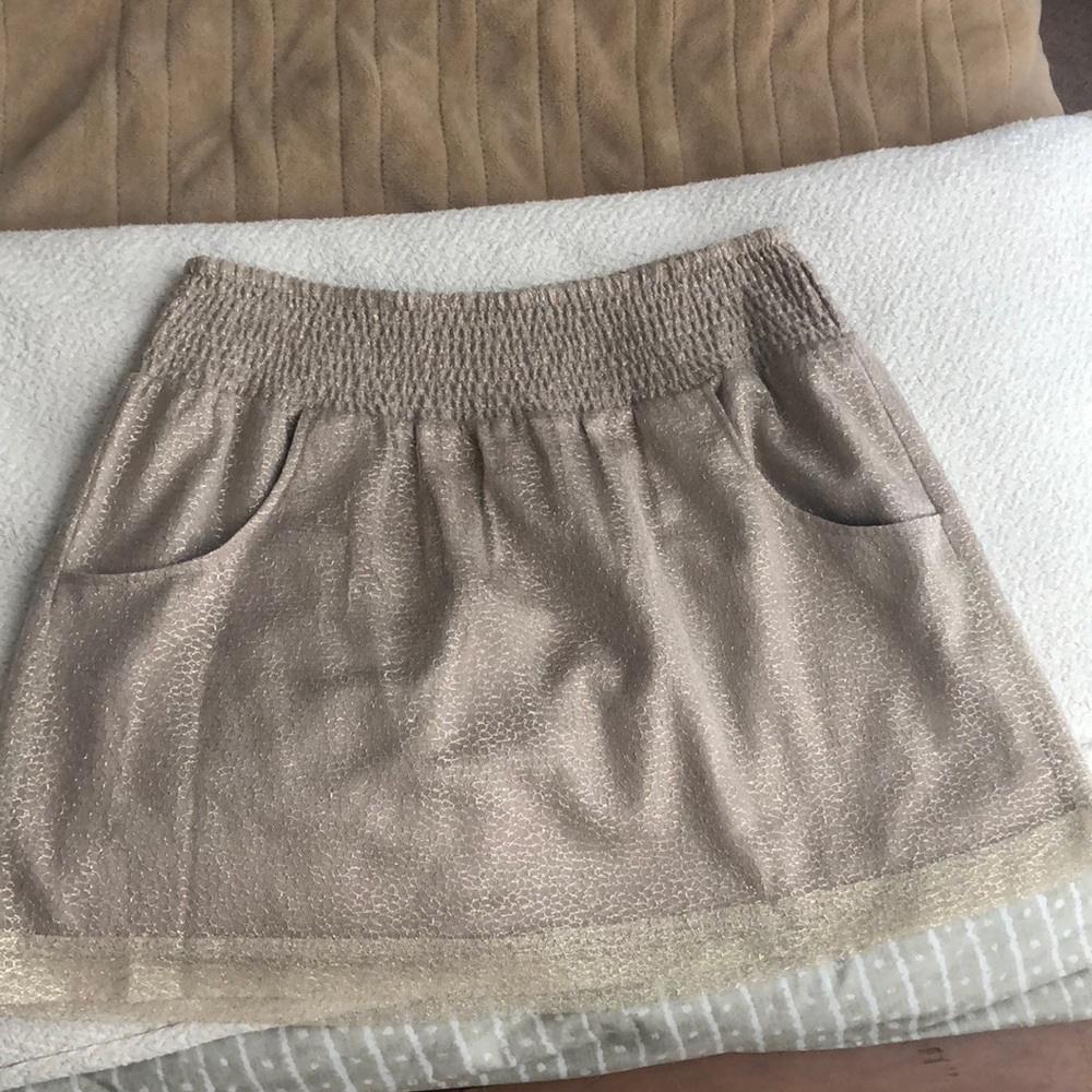 Above knee length gold/tan Gap skirt